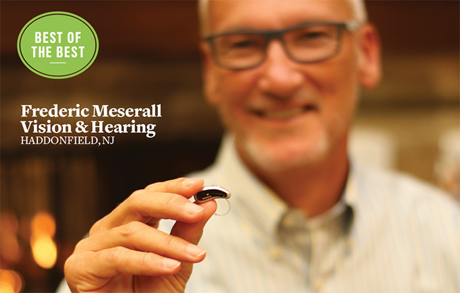 Fred Meserall with hearing aid