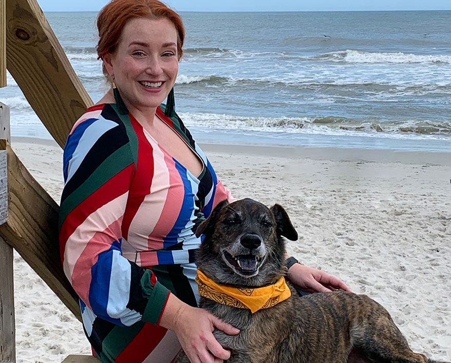 Dee and dog at the beach