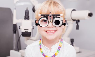 little girl checking her vision
