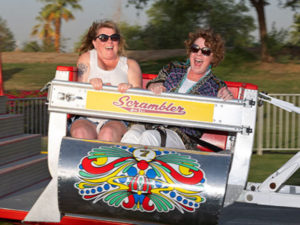 PECAA members put on brave faces when riding the Scrambler during Friday’s Member Appreciation Festival.