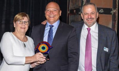 Dr. Susan Cooper, OGS Chair, Canada, and Dr. Juan Carlos Aragon, OGS Chair, USA, present CooperVision President Jerry Warner with the evening's highest honor.