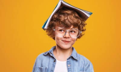 boy-with-book-on-head