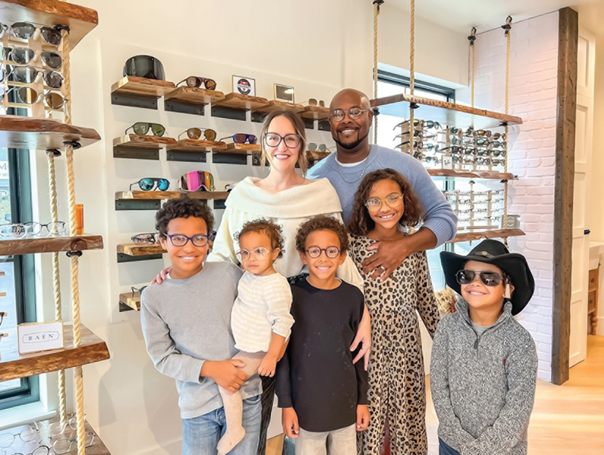 Chelsea and Dr. Antwan Randolph with their children in the optical at Eye Love Spearfish.